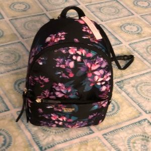Small Victoria’s Secret backpack.